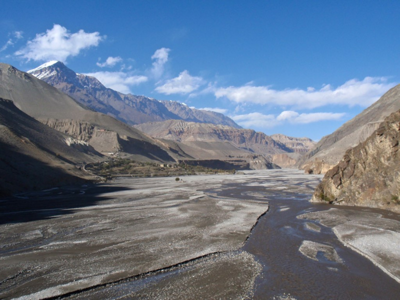 Traditional architecture and mountainous landscape of Tsarang village in Upper Mustang, Nepal